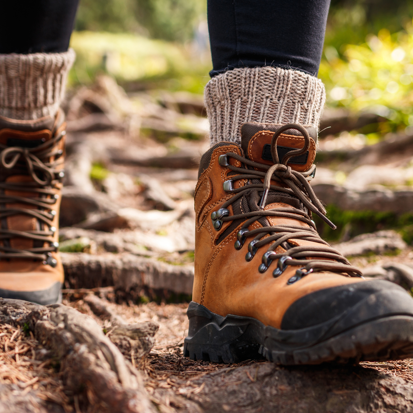 Closeup of hiking boots on Montana trail